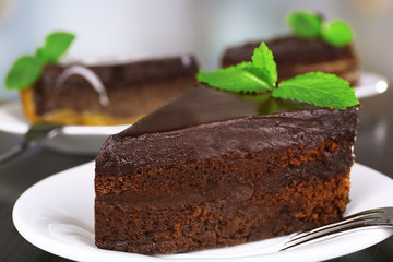 Pieces of chocolate cake on plates