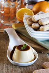 creme caramel with lady fingers and oranges