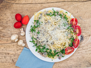Fresh Italian pasta with mushrooms and cream sauce