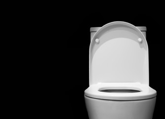 toilet bowl with black background