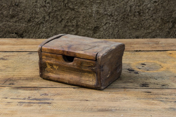 Old chest on wooden table still life