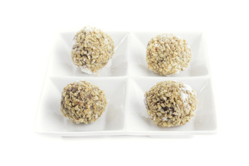 Peanut chocolate ball on white background