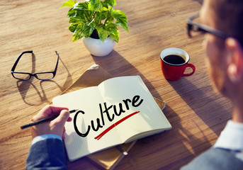 Businessman with Note About Culture Concepts