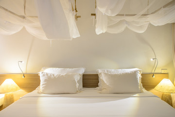 white pillows on a modern bedroom