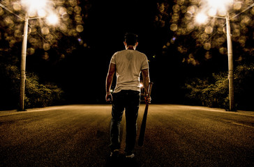Baseball Fury, boy walking in the street at night - obrazy, fototapety, plakaty