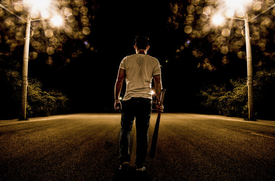 Baseball Fury, boy walking in the street at night