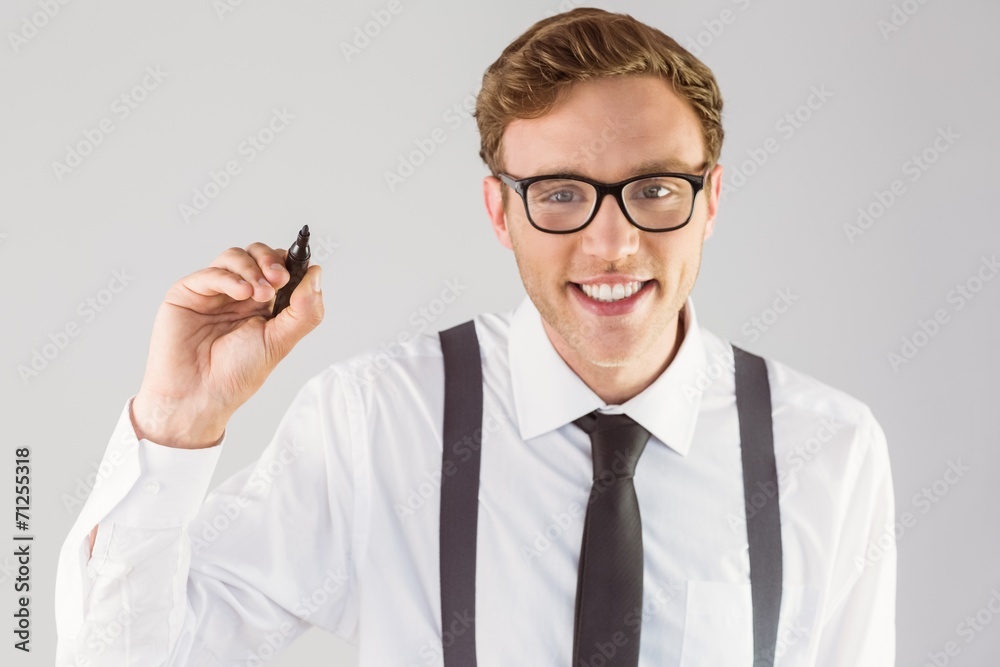 Poster geeky businessman writing with marker