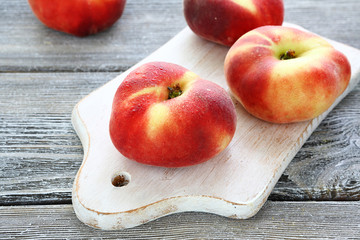 three ripe delicious peach