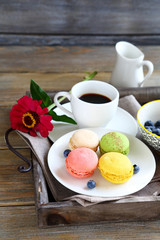 macaroon and coffee on tray