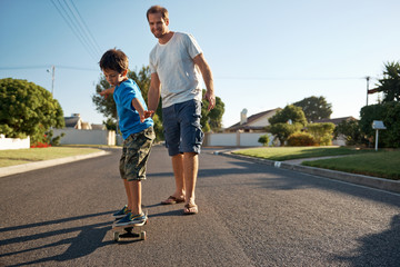 father son skateboard