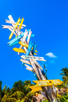 Signpost on beach in Tulum, Mexico