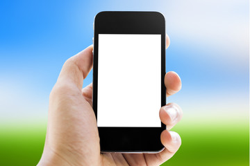 hand holding phone on sky background