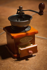 Old coffee grinder on a table