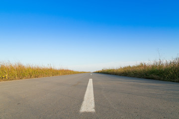 Empty road on sun