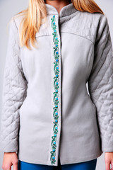 Closeup image of woman`s body wearing trendy jacket