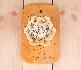 Close up of banana dessert on board.