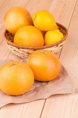 Close up of ripe fruits on wooden table.