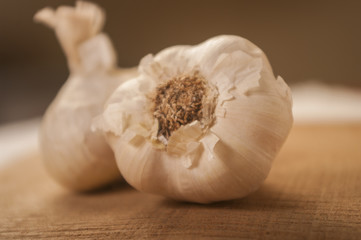 Garlic close up on wooden background close up