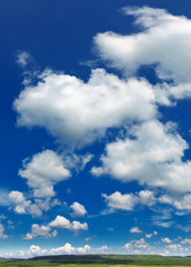 Naklejka na ściany i meble landscape with blue sky and clouds