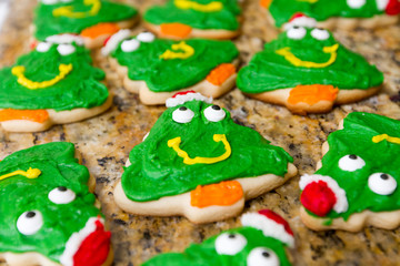 Freshly baked Christmas Cookies decorated with Fun Faces