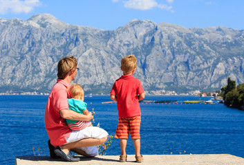 Fototapeta na wymiar father and kids travel on sea vacation