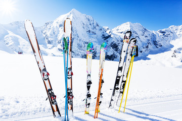 .Skiing , mountains and ski equipments on ski run