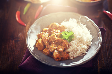 indian butter chicken curry with basmati rice