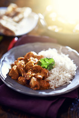 indian butter chicken curry with basmati rice
