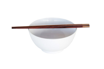 close up chopsticks and white bowl isolated on white.