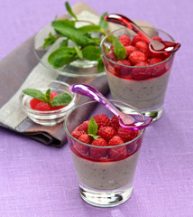 cups with yogurt mint and raspberries