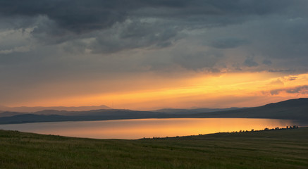 Fototapeta na wymiar Lake at sunset