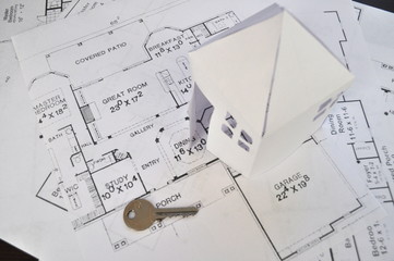 Real estate concept - construction plan, plan for house on table