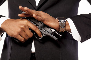 African businessman recharge his gun
