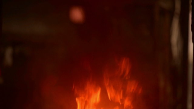 Hot flame burning inside furnace