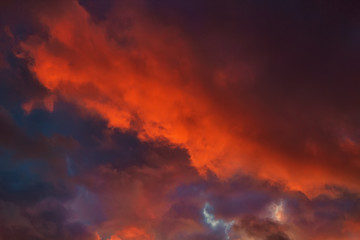 Fototapeta na wymiar Dark cloudy dramatic sky in sunset.