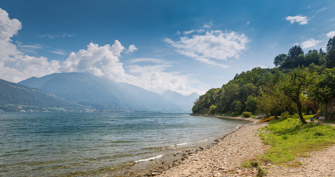 Time to relax on a quiet beach at Lake Como on a sunny day