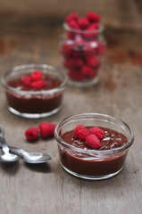 Chocolate mousse with raspberries, selective focus
