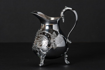 Old Silver Pitcher With Decorative Stamping Pattern © sunny_bunny