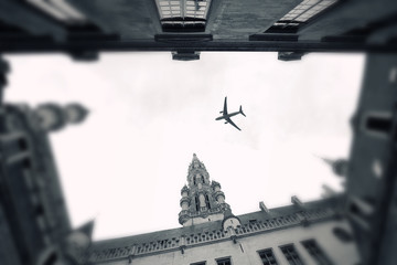 plane over the city of Brussels tilt - shift