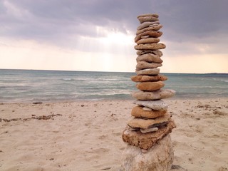 Fototapeta na wymiar stone pillar at the beach