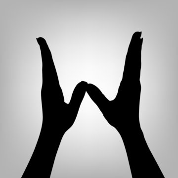 Silhouette woman hand. Letter W