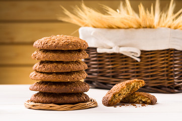 Oatmeal cookies on wooden table - 71293588