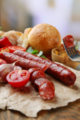 Smoked thin sausages and vegetables