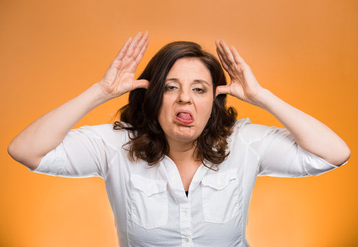  bully woman sticking tongue out mocking someone 