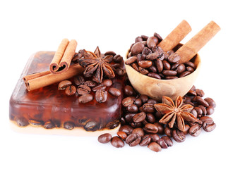 Obraz na płótnie Canvas Organic soap with coffee beans and spices, isolated on white