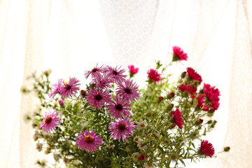 Beautiful flowers on fabric background