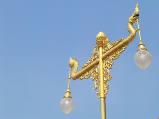 Fototapeta na wymiar Thai style light pillar with blue sky