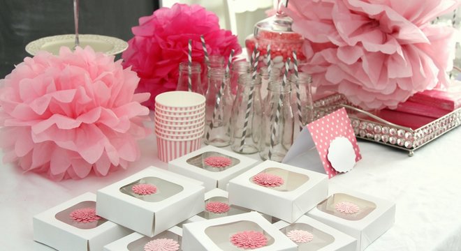 Decorated table for a girl baby shower