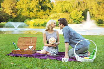 Handsome man kissing his wife