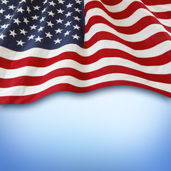 American flag on blue background. Copy space